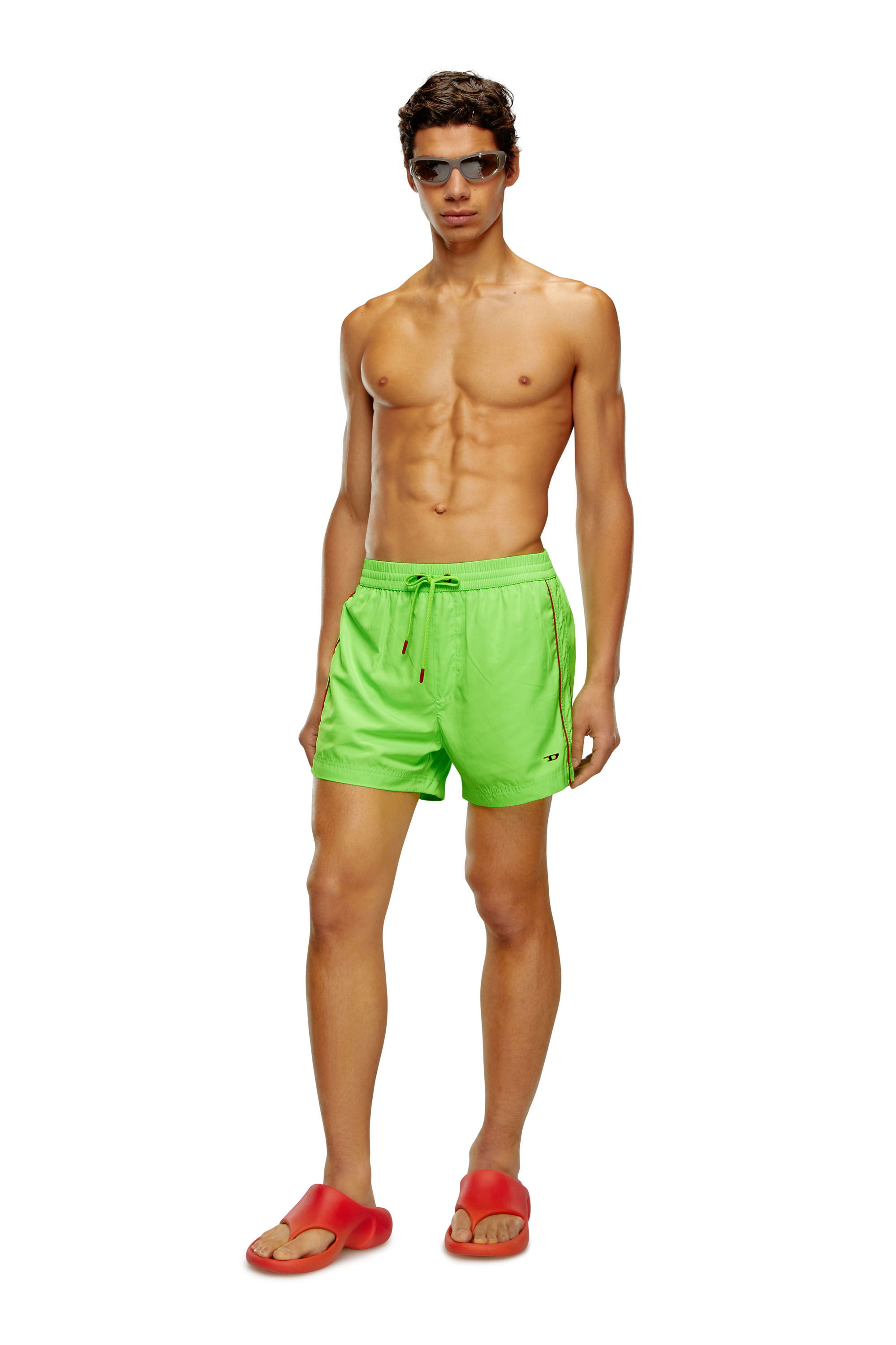 Mid-length swim shorts with piping