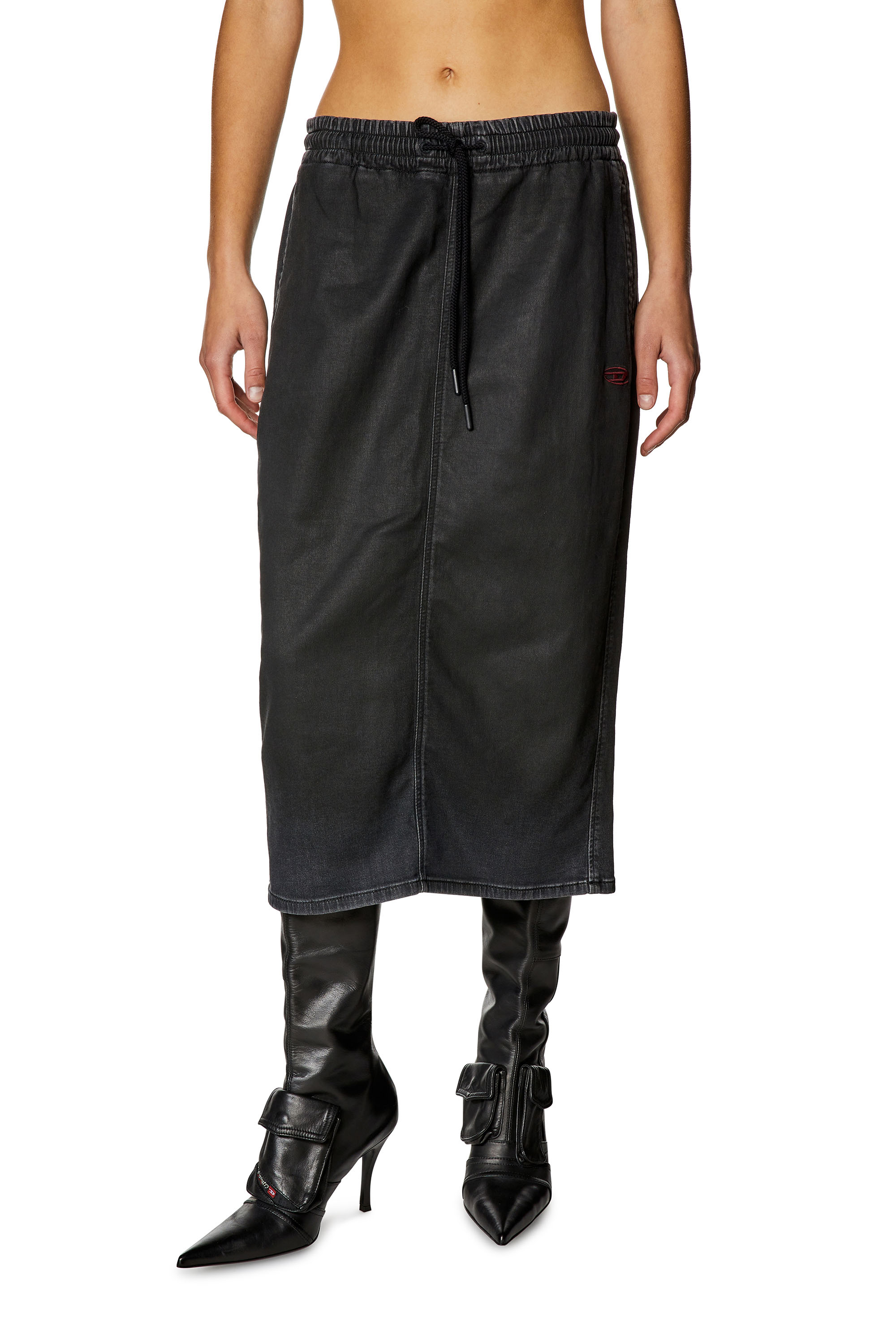 Skirt in coated denim