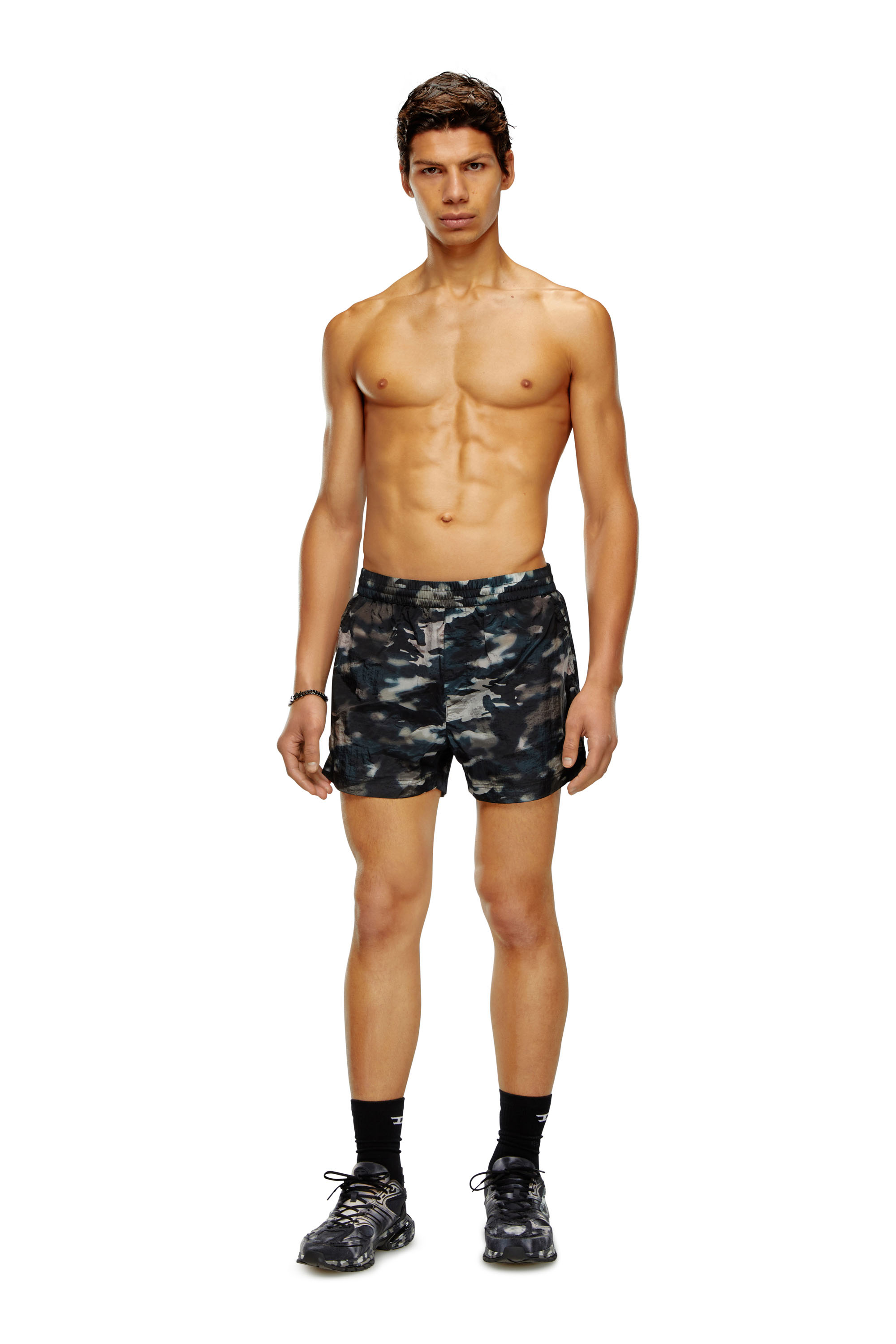 Swim shorts with utilitarian print