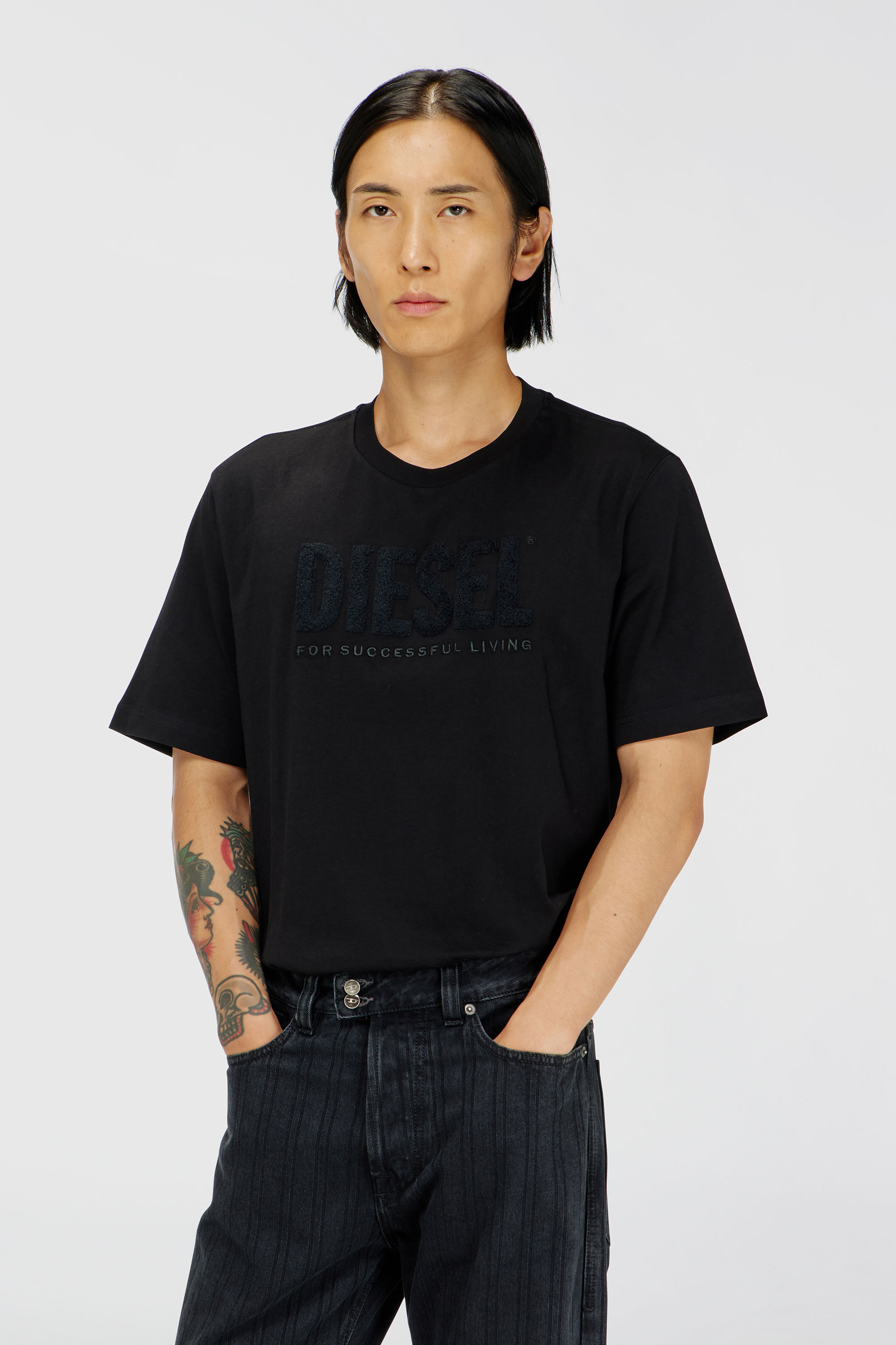 Diesel - T-JUST-OVA-T92, Man's Cotton T-shirt with tonal Diesel logo print in Black - 1