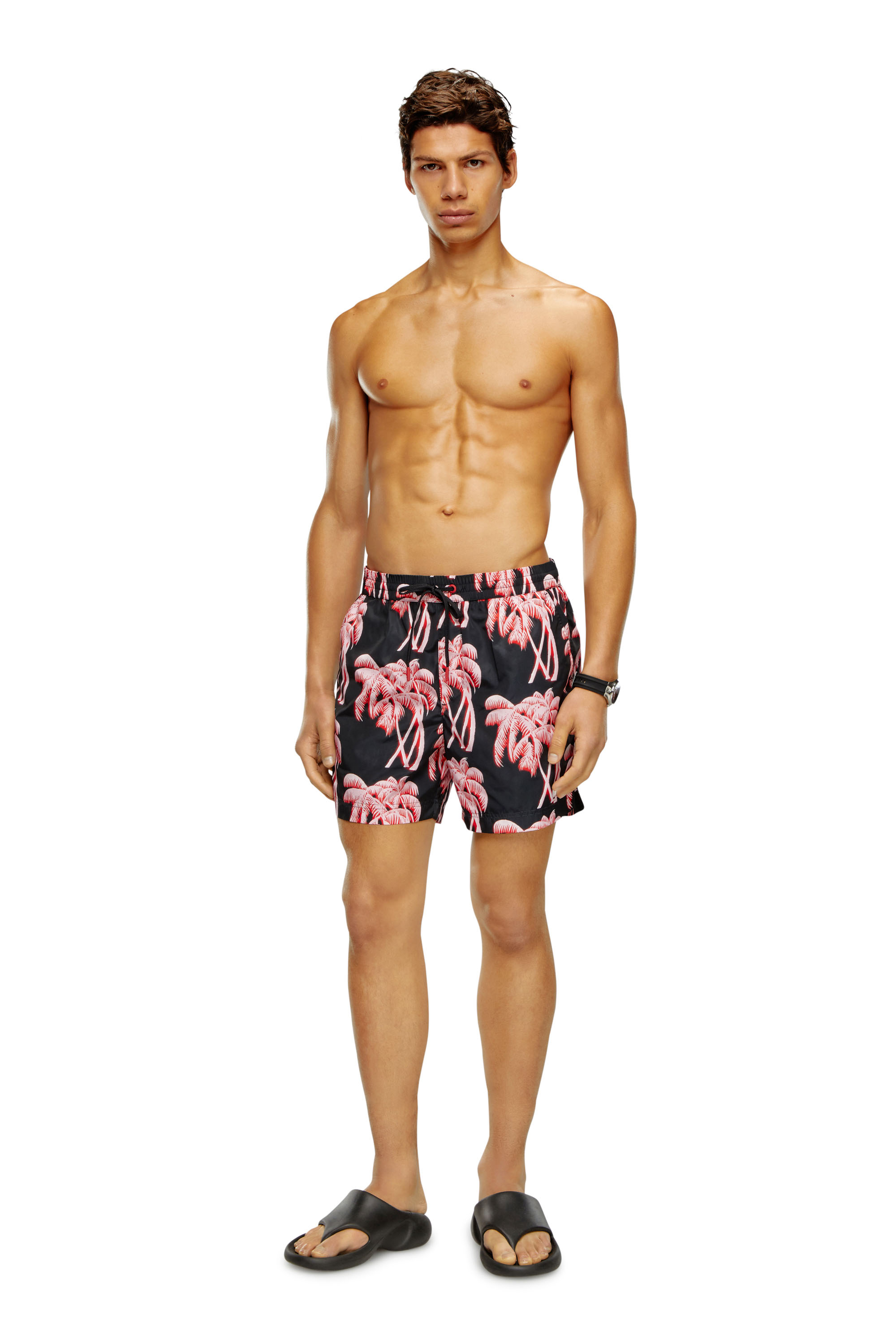 Board shorts with palm tree print